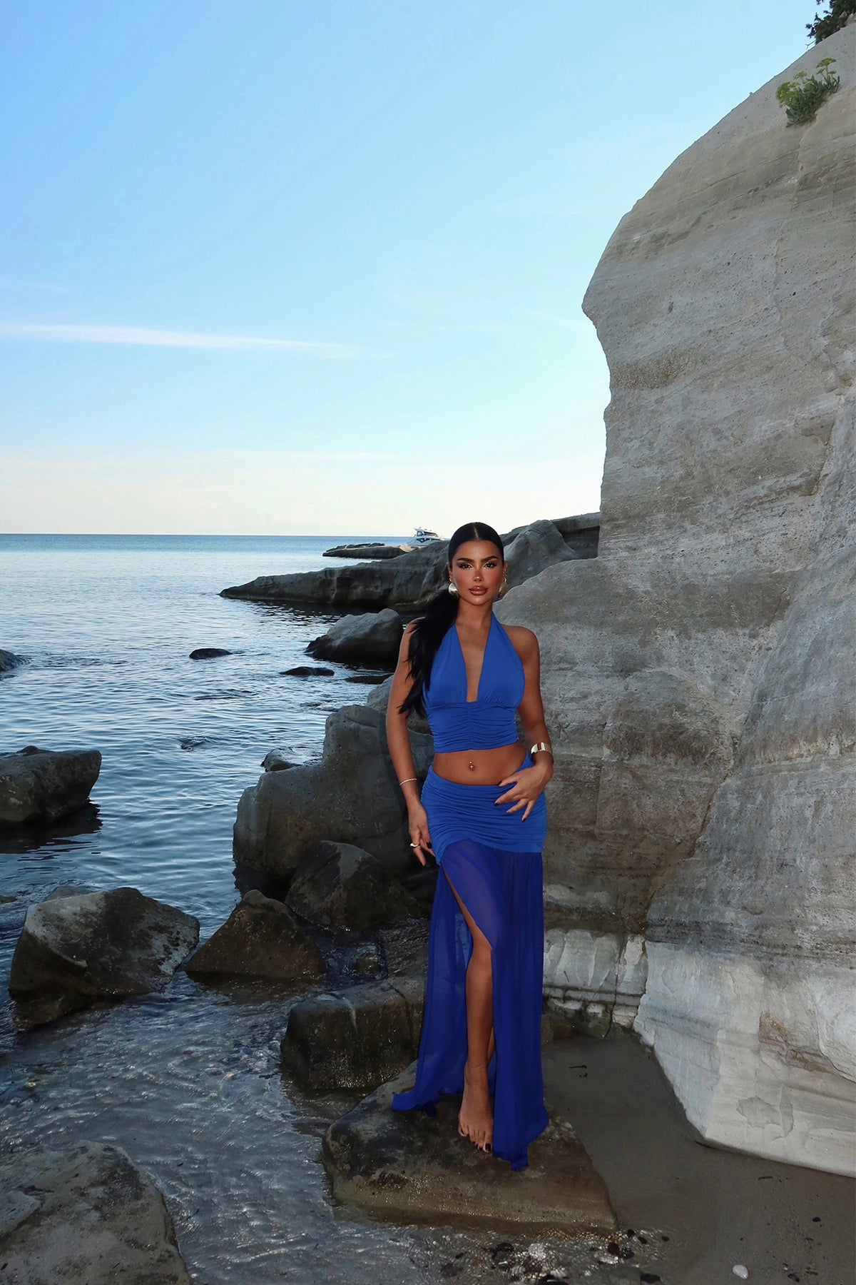 Low-Cut Navy Blue Skirt Suit with Slit Detail