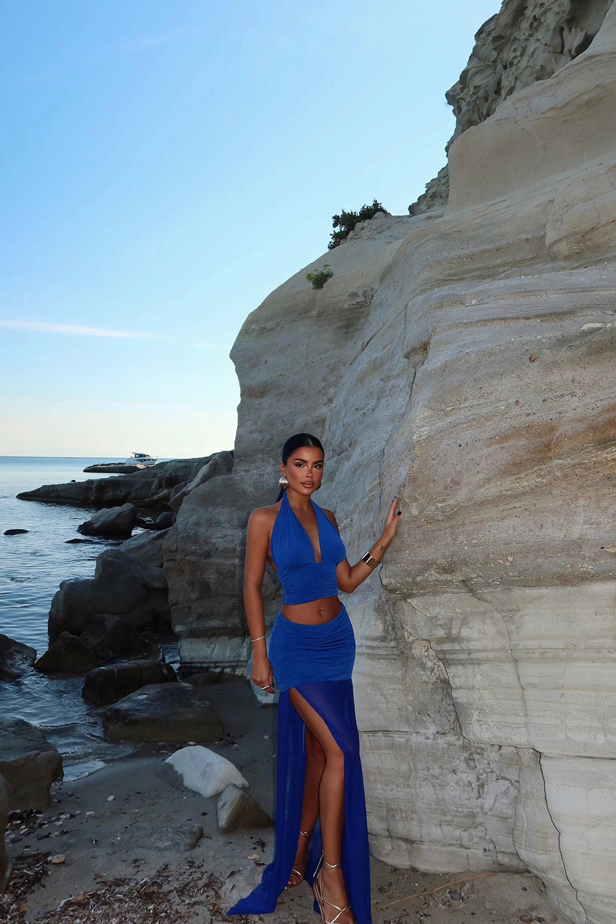 Low-Cut Navy Blue Skirt Suit with Slit Detail