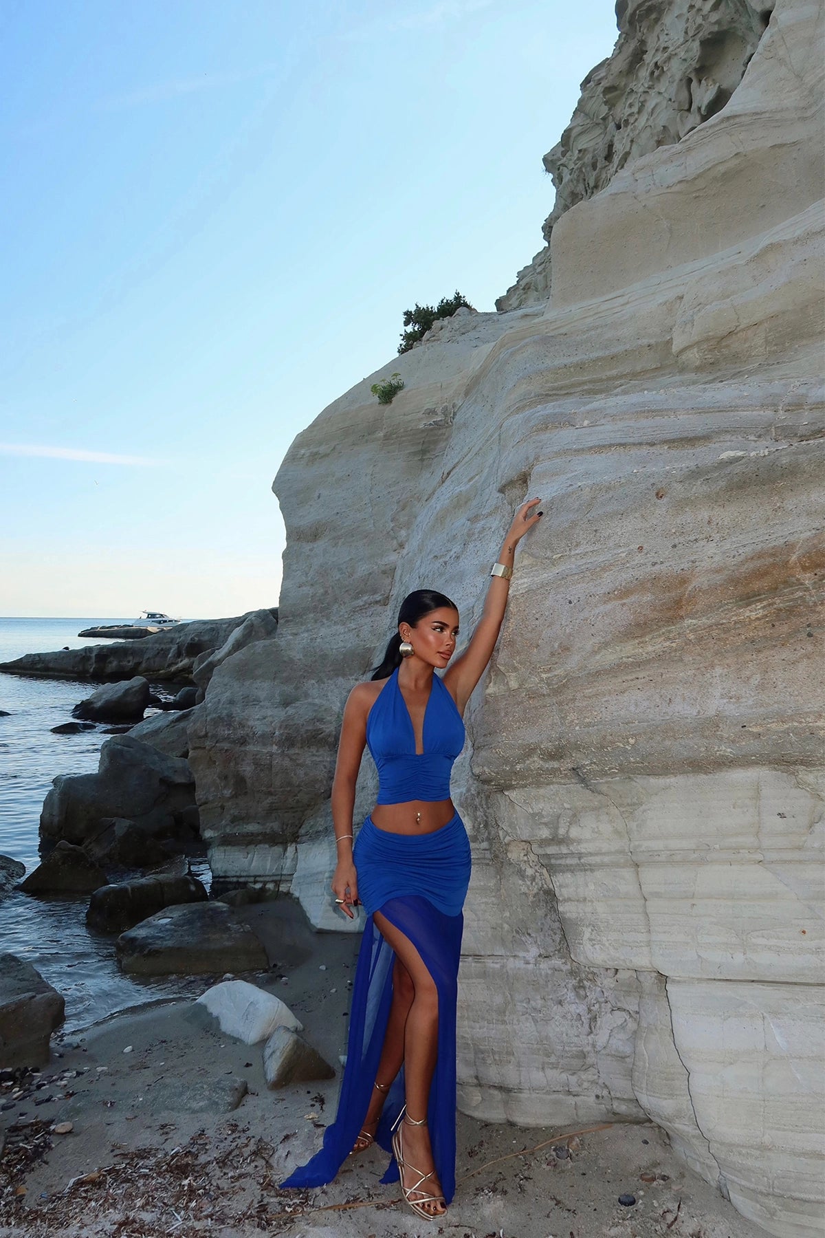 Low-Cut Navy Blue Skirt Suit with Slit Detail