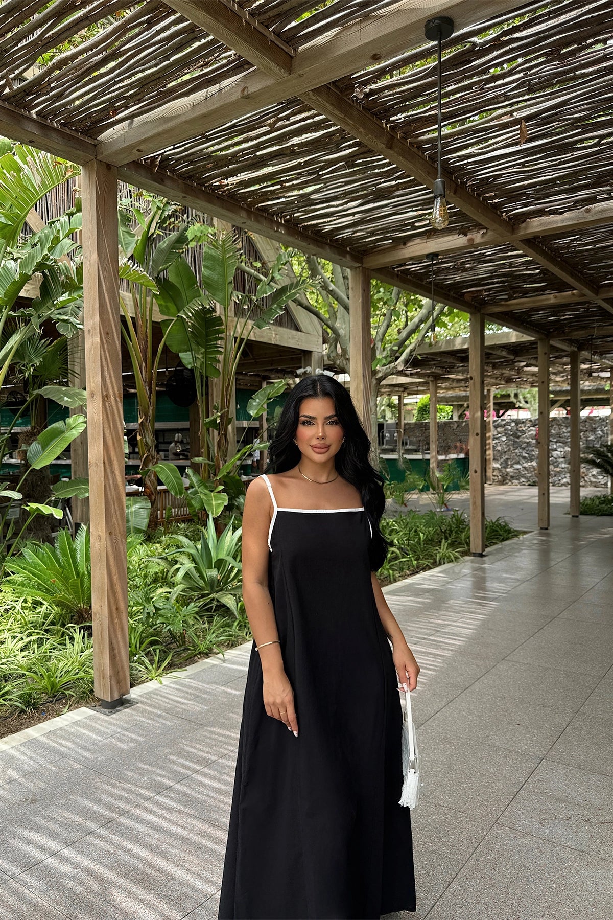 Sleeveless Black Maxi Dress with Tie-Back Detail